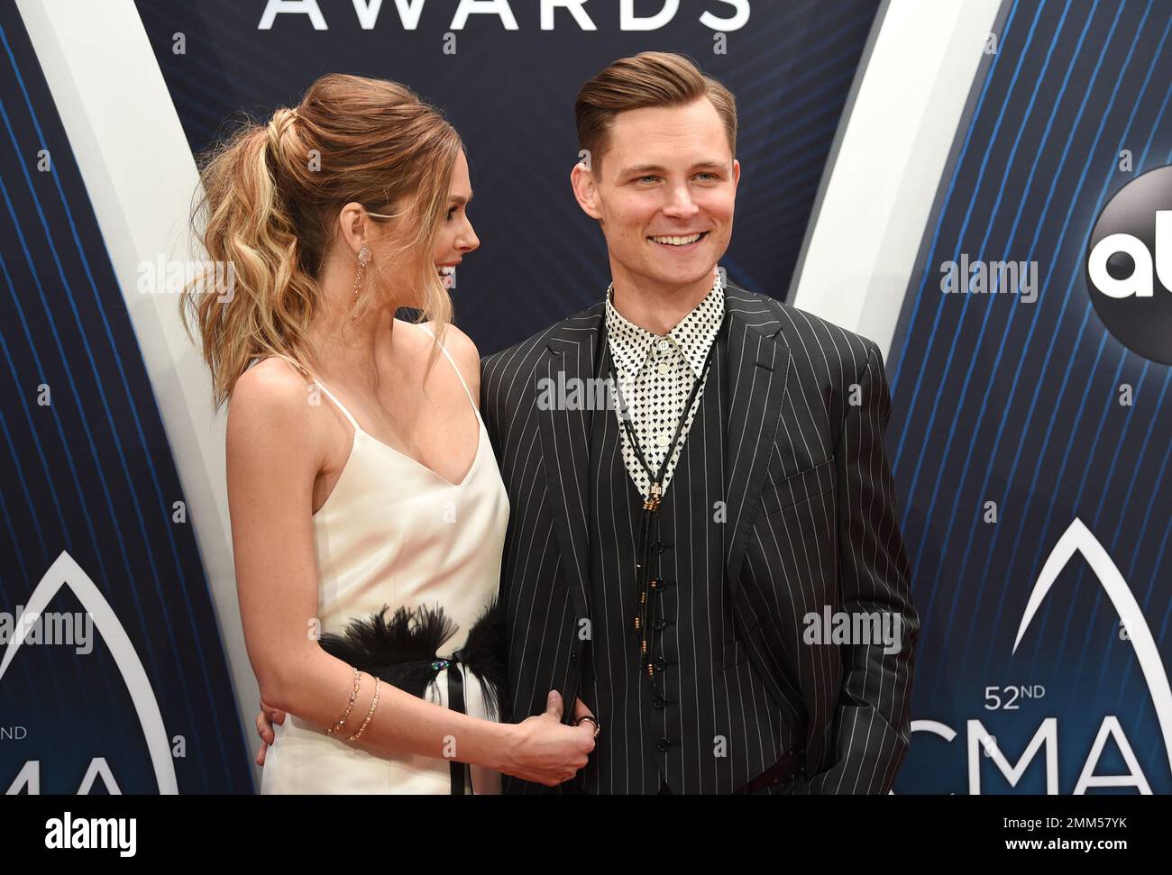 Christina Murphy, left, and Frankie Ballard arrive at the 52nd annual
