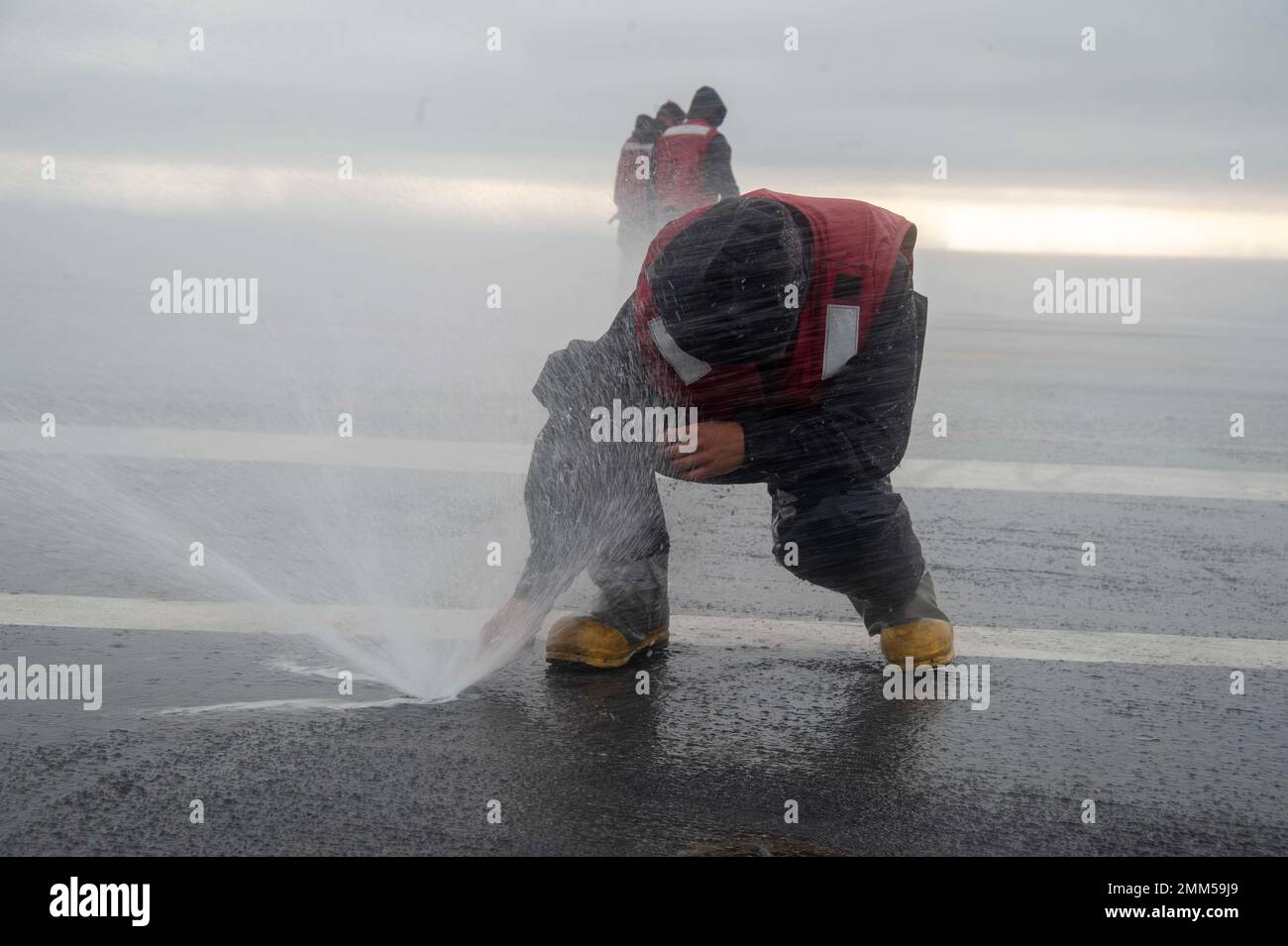 220914NNX6351073 PACIFIC OCEAN. (Sept. 14, 2022) a Sailor uses a