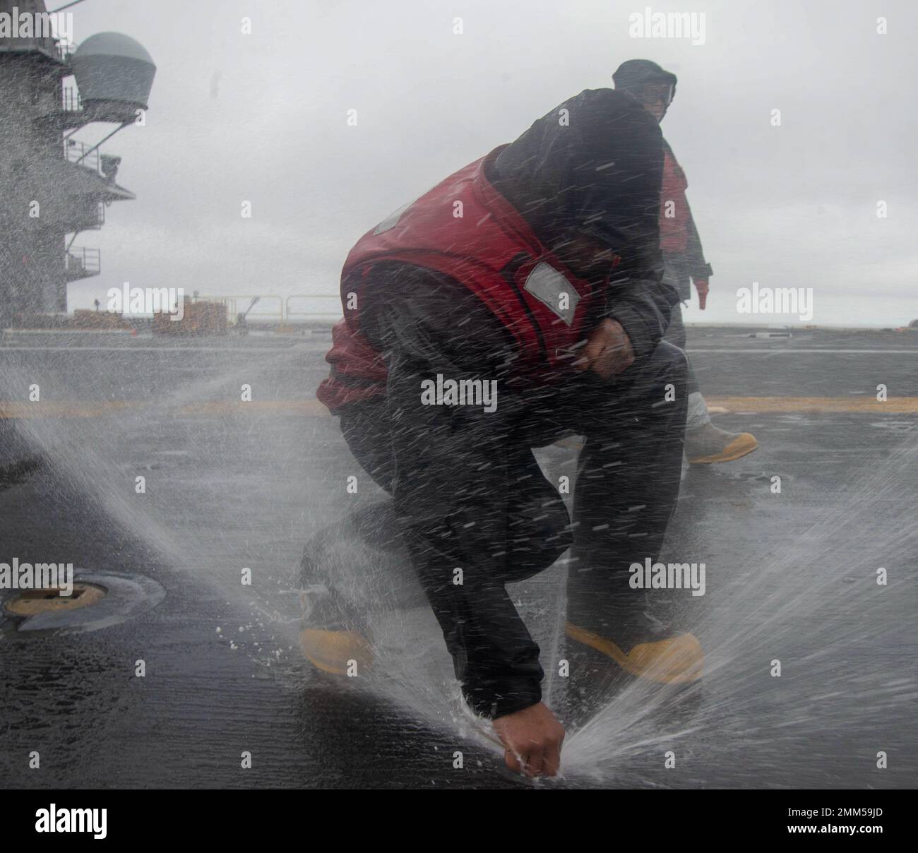 220914NNX6351186 PACIFIC OCEAN. (Sept. 14, 2022) a Sailor uses a