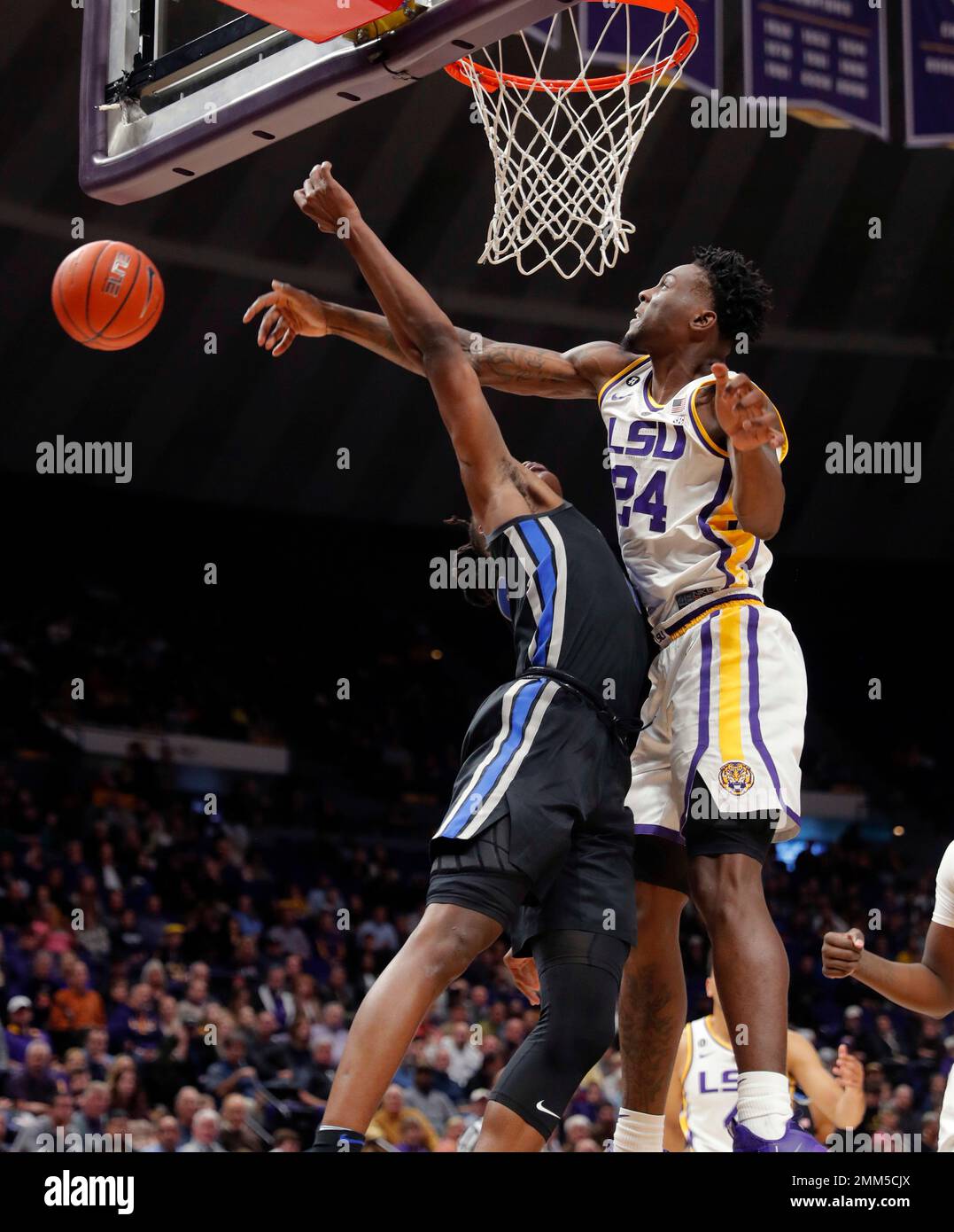 LSU forward Emmitt Williams (24) blocks a shot by Memphis forward Kyvon ...