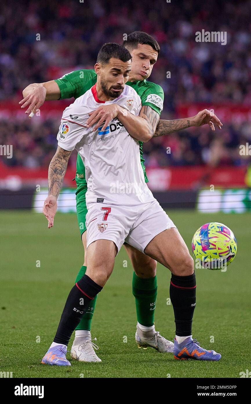 Seville, Spain. 28th Jan, 2023. Suso (7) of Sevilla FC and Lautaro Blanc (2) of Elche seen during the LaLiga Santander match between Sevilla FC and Elche at Estadio Ramon Sanchez Pizjuan in Seville. (Photo Credit: Gonzales Photo/Alamy Live News Stock Photo