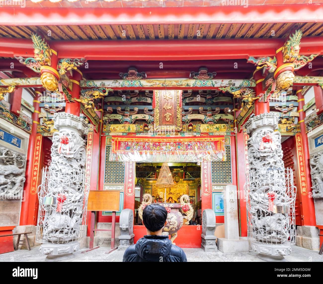 Tainan, JAN 5 2023 - Man was praying in the traditional Shuixian Gong temple Stock Photo