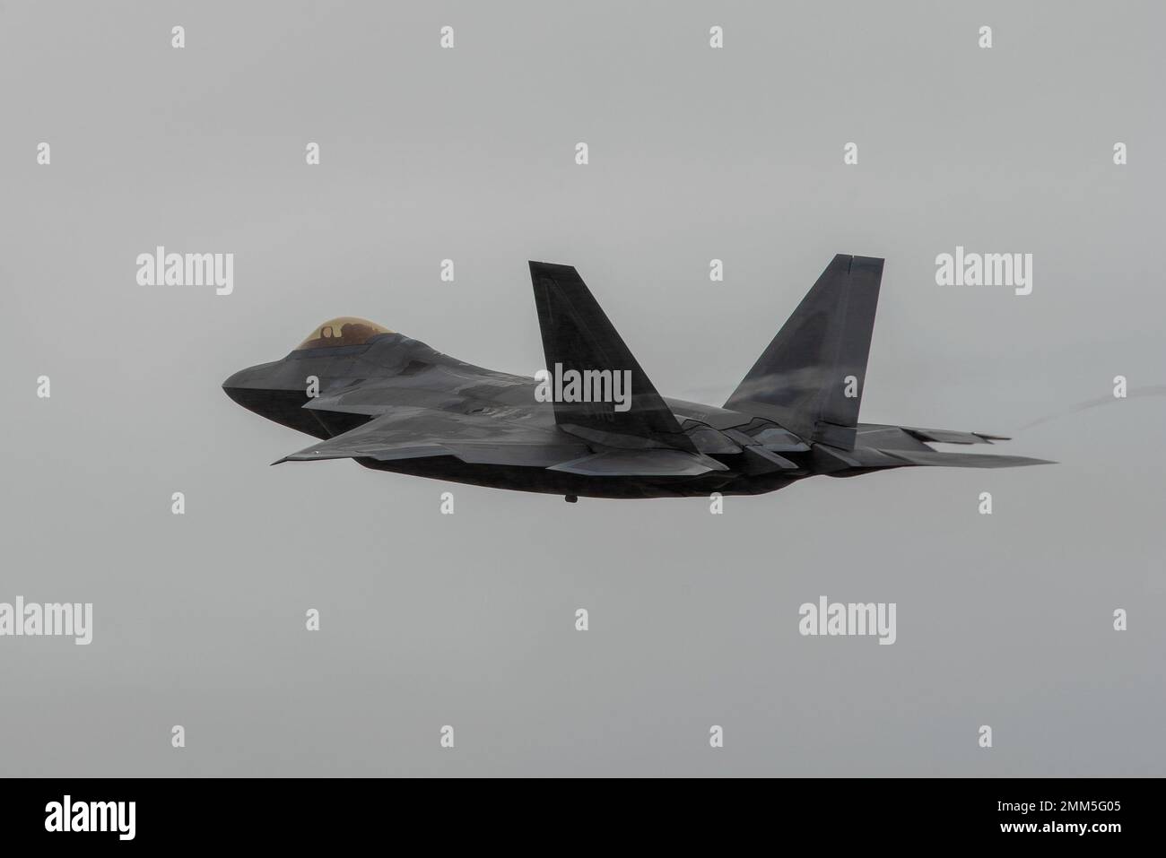 A U.S. Air Force F-22 Raptor assigned to the 90th Expeditionary Fighter ...