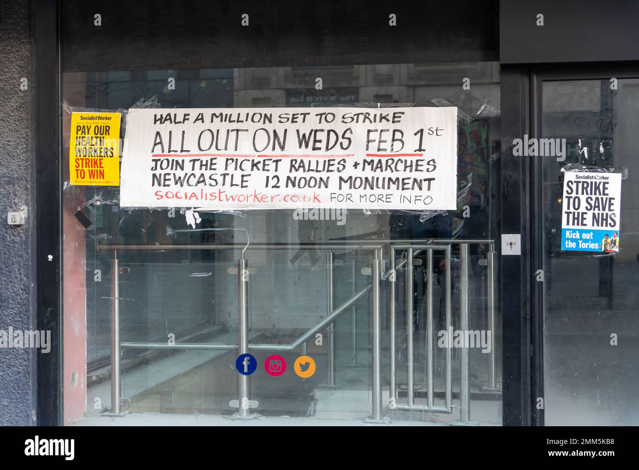 Newcastle upon Tyne, UK. January 29th 2023. Signs on an empty shop highlight arrangements for multiple strikes expected on Wednesday 1st February over pay and conditions. Industrial action is scheduled by several trades unions, including PCS, NEU, ASLEF, RMT and UCU, with the TUC declaring a national, 'protect the right to strike' day, following the government's plans for anti-strike legislation. Credit: Hazel Plater/Alamy Live News Stock Photo