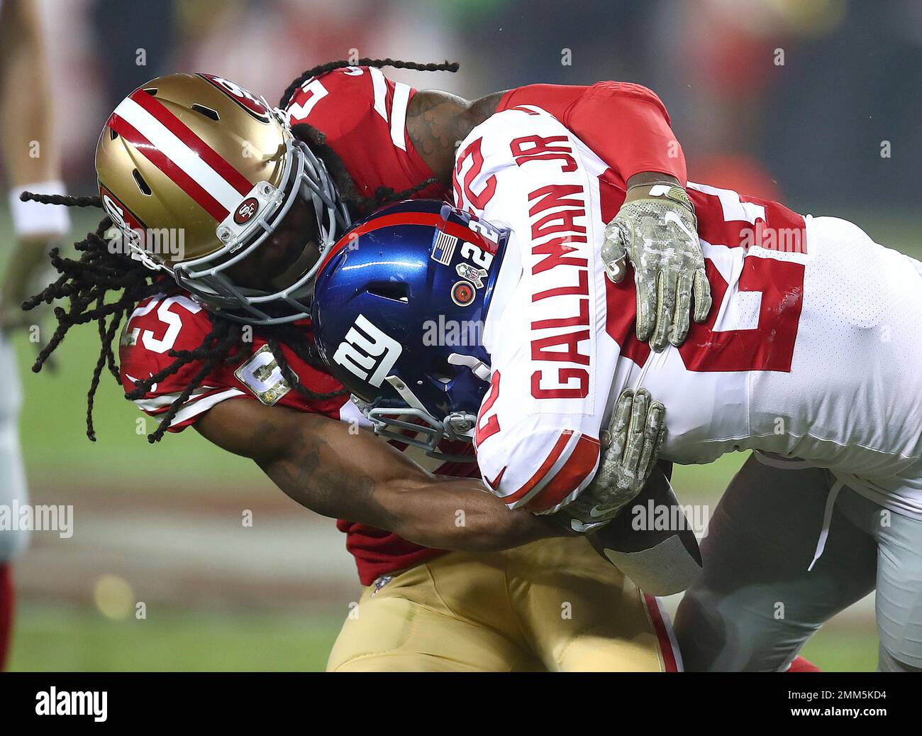 San Francisco 49ers defensive back Richard Sherman, left, tackles New ...