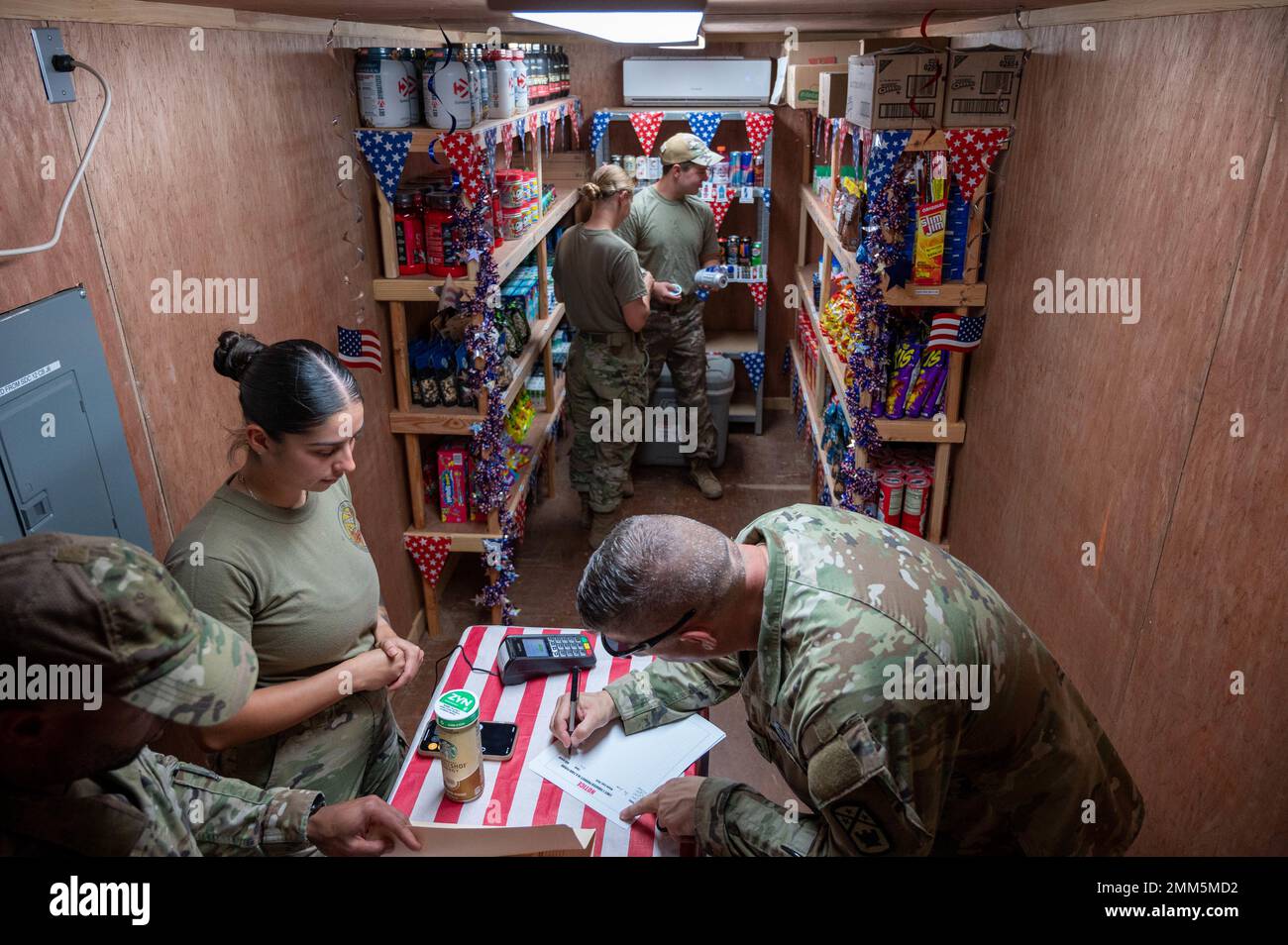 Customers shop and buy items in the Army and Air Force Exchange Service