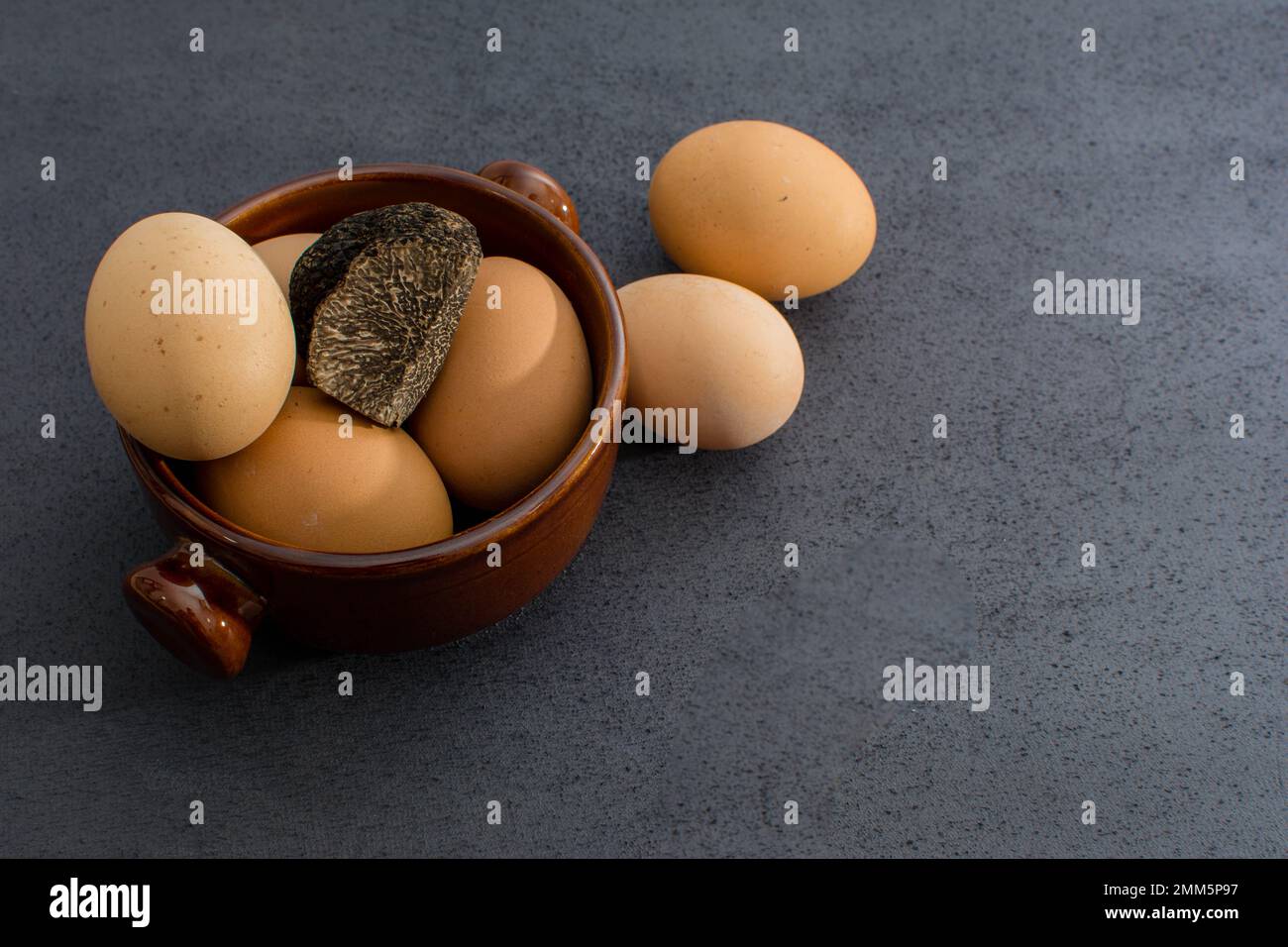 Truffled eggs with a tuber melanosporum winter truffle Stock Photo