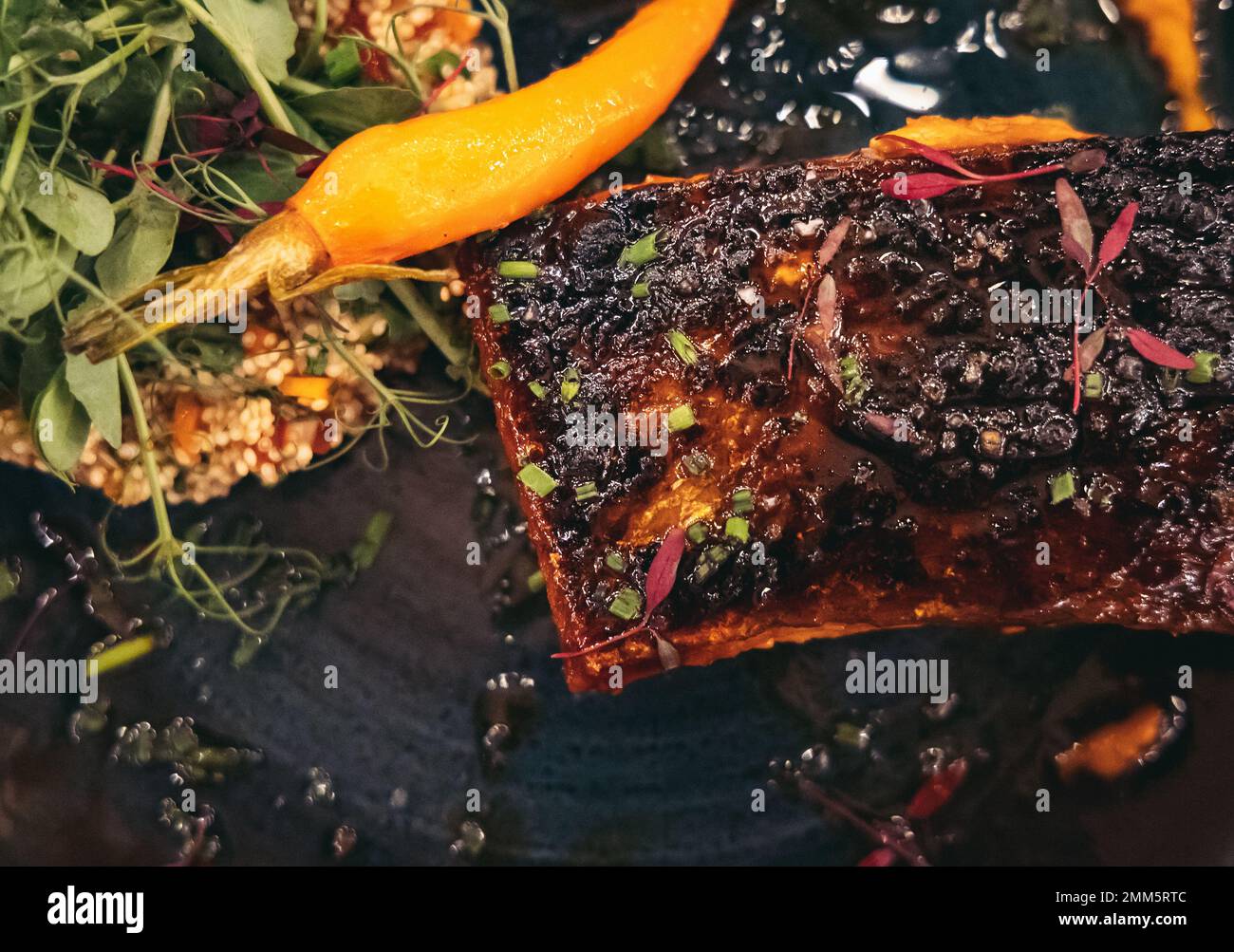 Grill glazed salmon fillet with quinoa salad in Cyprus island country Stock Photo