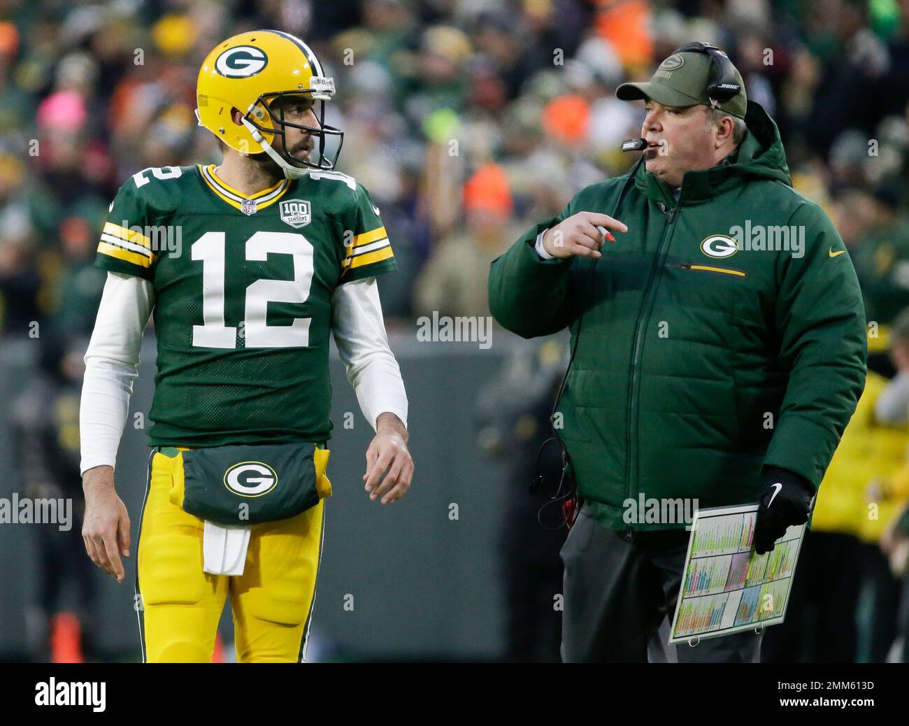 Green Bay Packers head coach Mike McCarthy talks to Aaron Rodgers ...