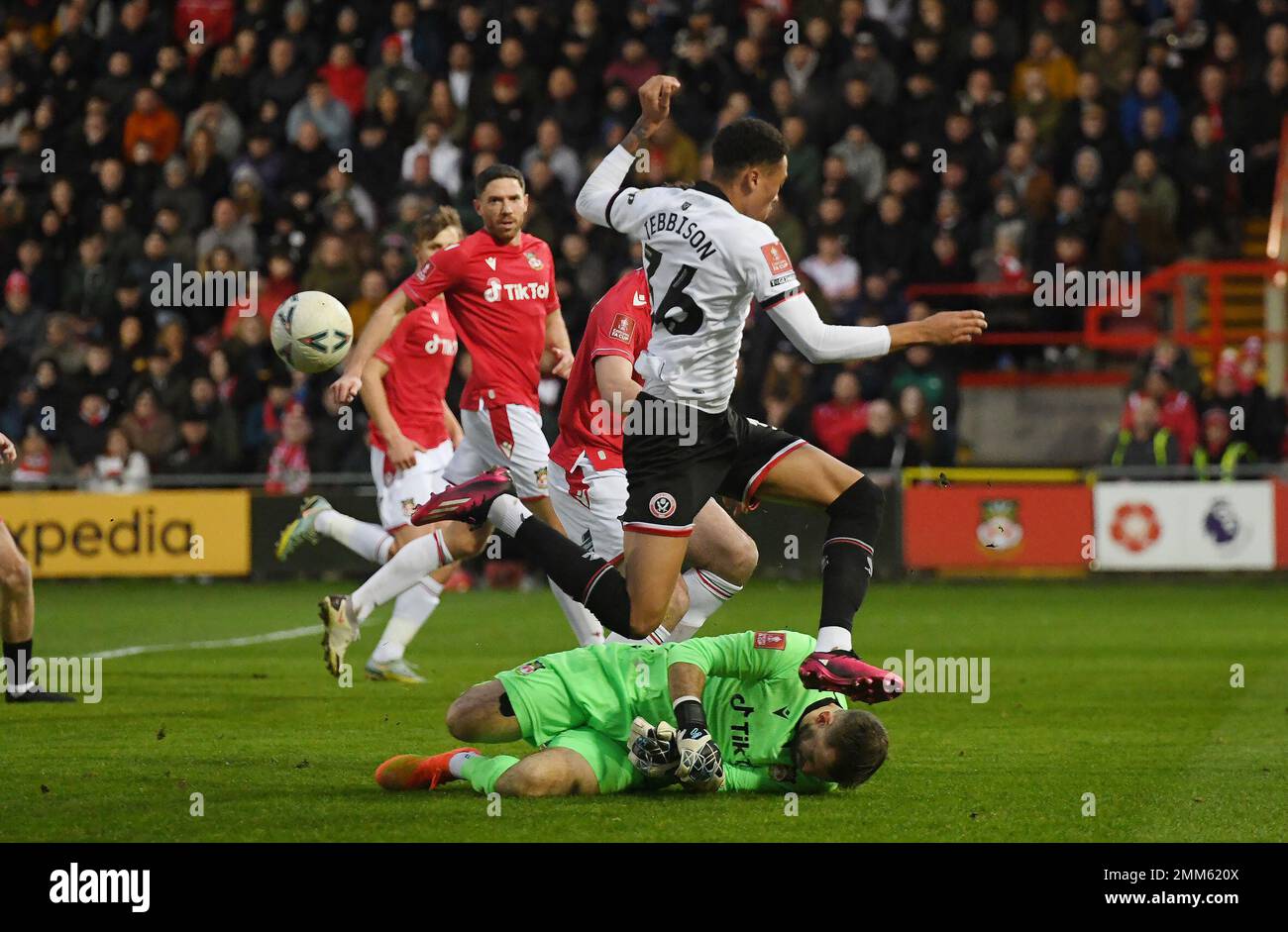Wrexham, UK. 29th Jan, 2023. Daniel Jebbison of Sheffield Utd has a shot saved by Mark Howard of Wrexham during the The FA Cup match at the Racecourse Stadium, Wrexham. Picture credit should read: Gary Oakley/Sportimage Credit: Sportimage/Alamy Live News Stock Photo