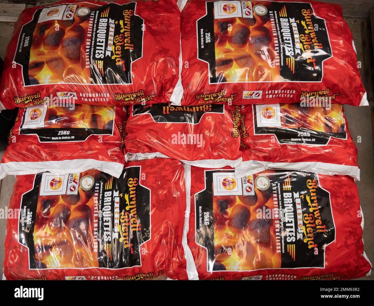 For Sale 25kg bags of Burnwell Blend briquettes smokeless fuel Stock Photo
