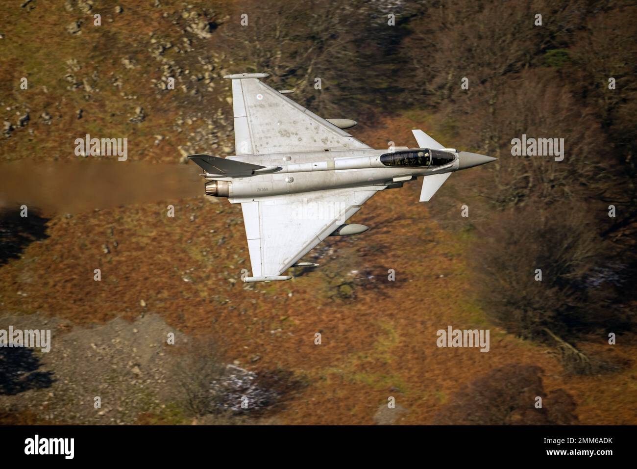 RAF Typhoon (Eurofighter) callsign 'Havoc' on a low level training flight during winter in LFA17, at Ullswater in the Lake District Stock Photo