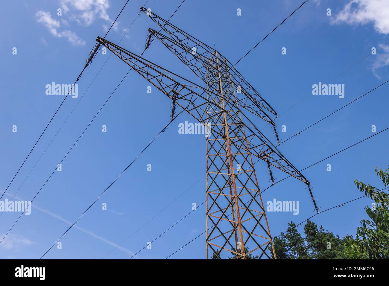 Electricity tower against blue sky in Poland Stock Photo
