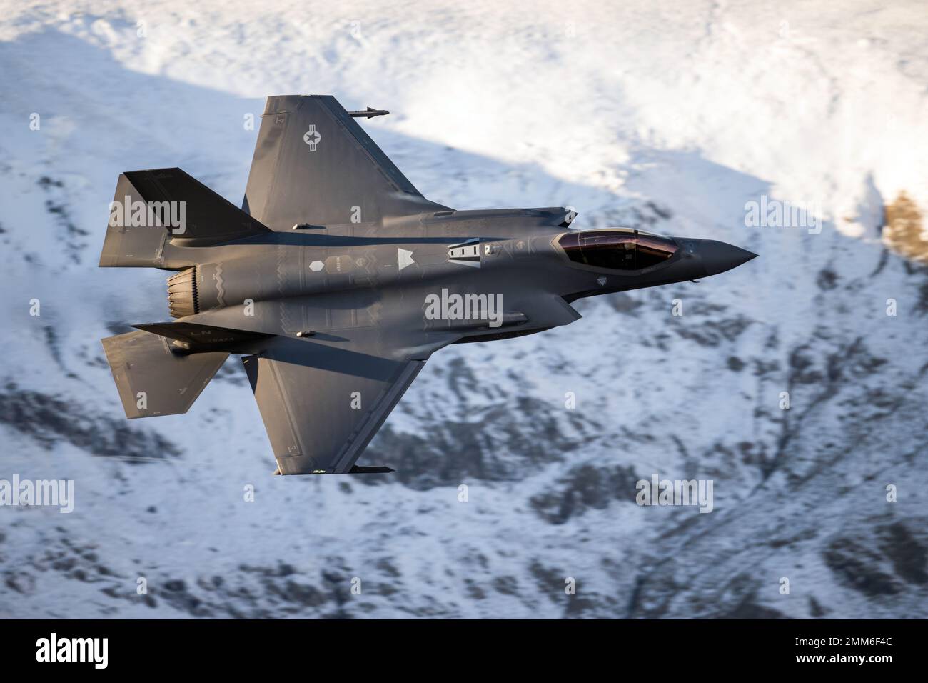 USAF F-35A Lightning II 'Axe' flight from RAF Lakenheath 495th Valkyries squadron operating low level in the Lake District during winter Stock Photo