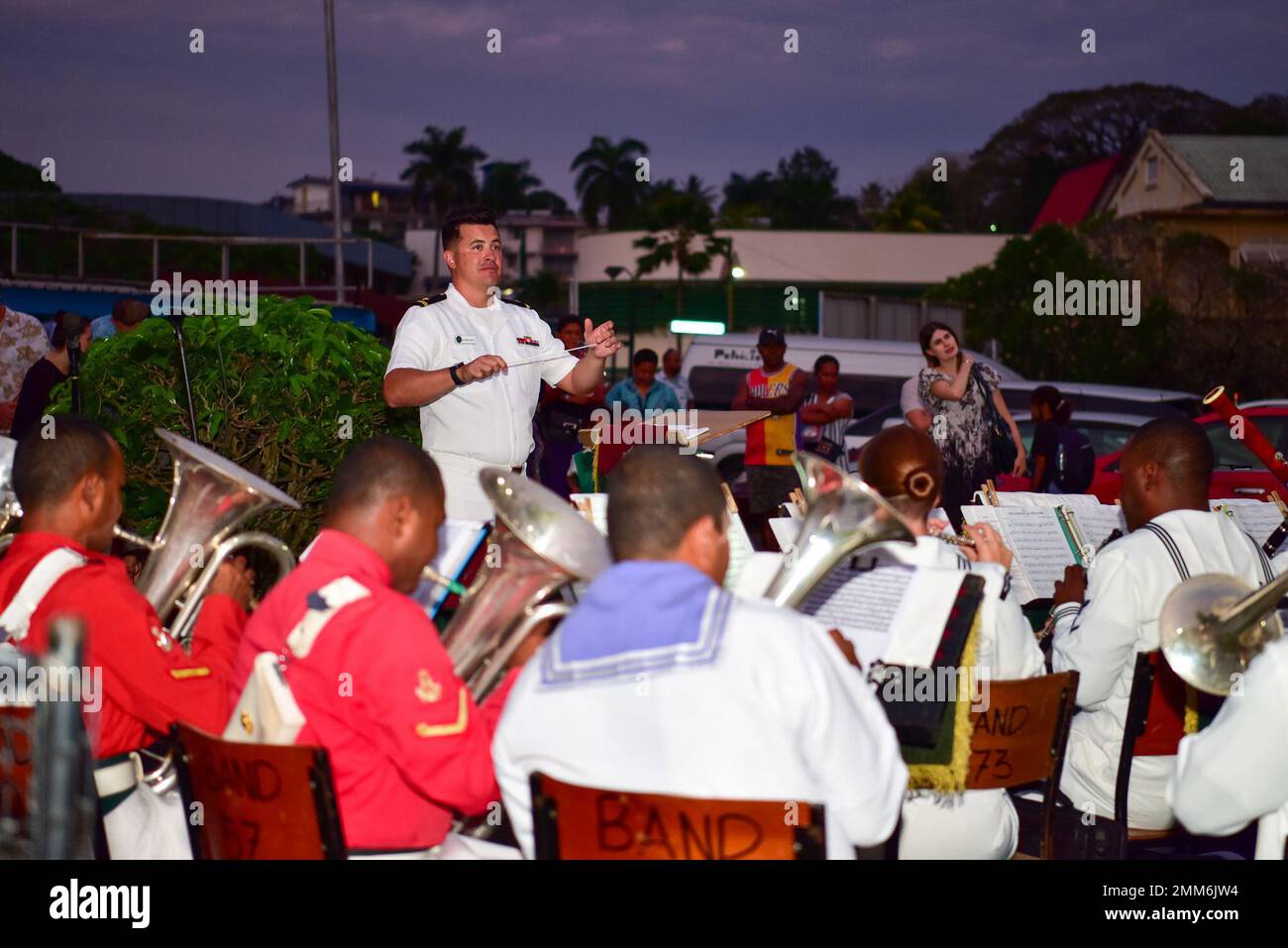 SUVA, Fiji (Sept. 15, 2022) Ens. Antonio Garcia, assistant fleet bandmaster of U.S. Pacific Band (PACFLT), conducts a combined performance of PACFLT and the Republic of Fiji Military Forces Band during a concert in Suva, Fiji. The visit to Fiji emphasized the U.S. commitment to strengthening partnerships for an enduring free and open Indo-Pacific. Stock Photo