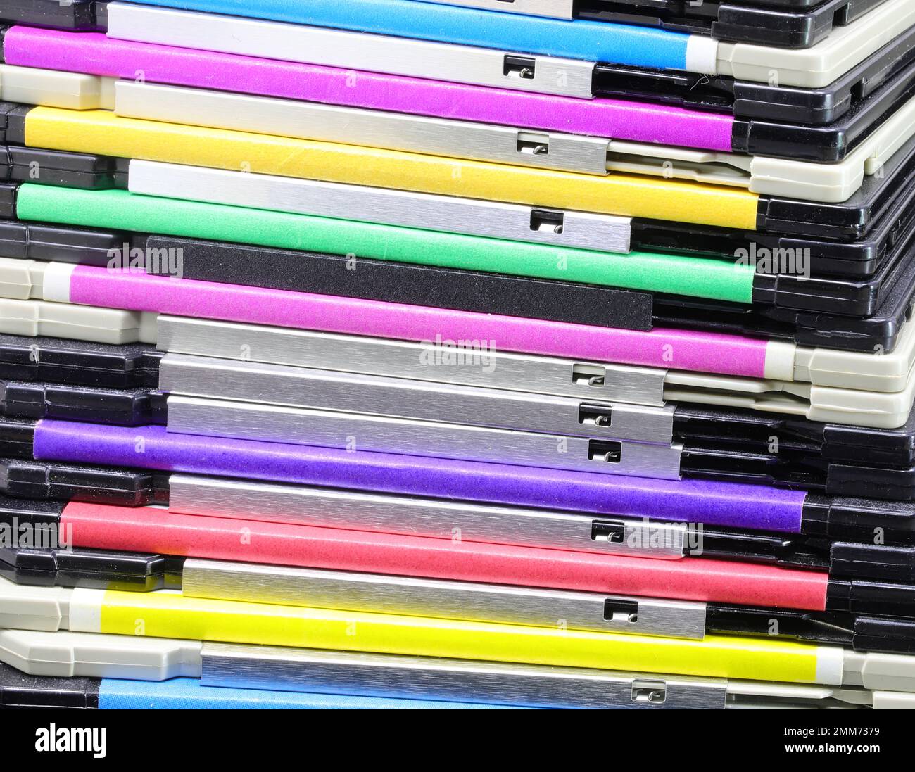 old magnetic floppy disks used to save data from early personal ...