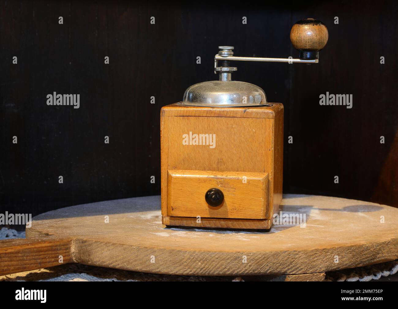 old coffee grinder to pulverize the beans and prepare the drink with