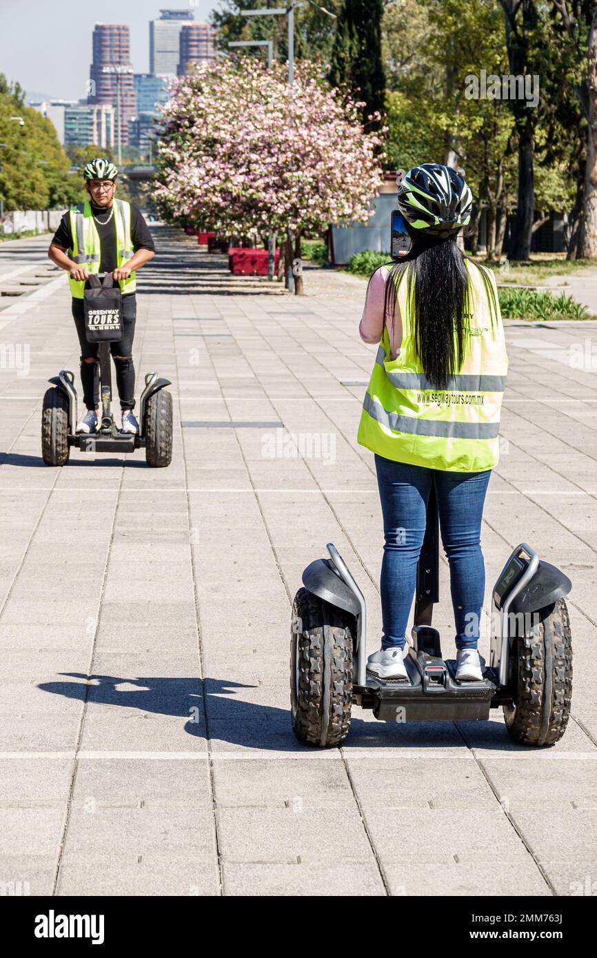 Mexico City,Bosque de Chapultepec Section 2 Forest,Composers Walk Promenade,Segway two-wheeled self-balancing personal transporter,helmet reflective v Stock Photo