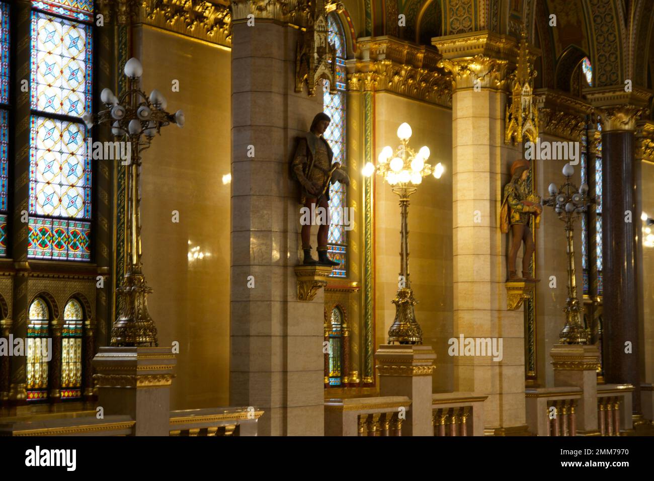 BUDAPEST, HUNGARY - MARCH 03, 2019: Gallery with lots of gold, marble and sandstone inside the Budapest Parliament building, the seat of the Stock Photo