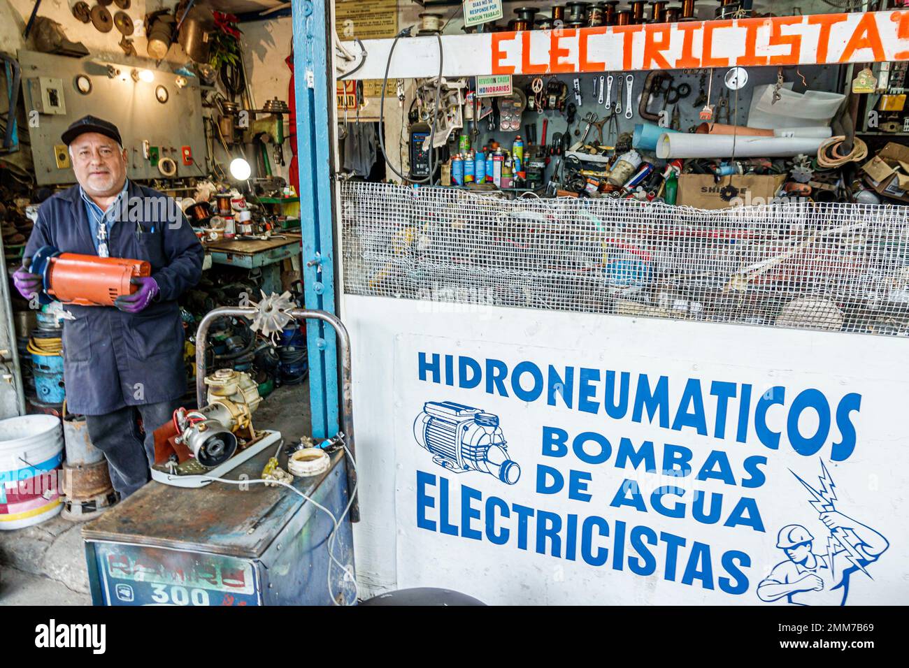 Mexico City,electric motors repair repairman holding,man men male,adult
