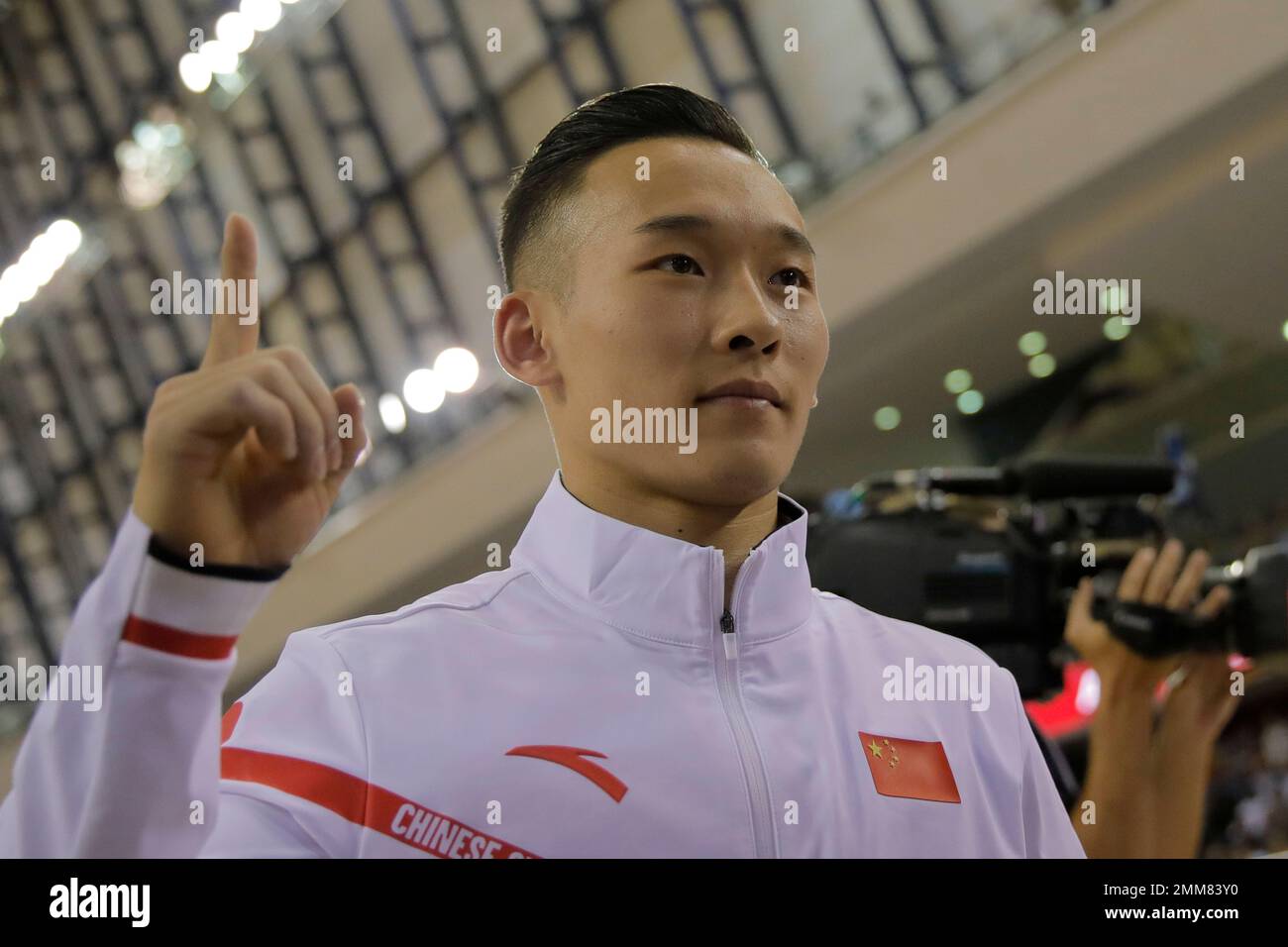 Gold medallist China's Xiao Ruoteng celebrates after the men's pommel