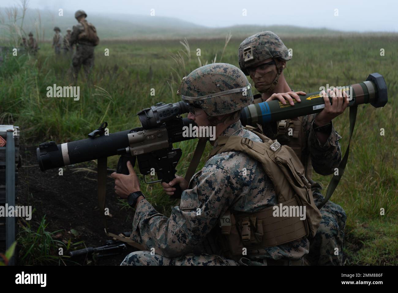 U.S. Marine Corps Cpl. Jacob Michaltz (left) and Lance Cpl. Atticus Pond (right), both riflemen with 3d Battalion, 3d Marines, load a Mk 153 shoulder-launched multipurpose assault weapon during Fuji Viper 22.5 at Combined Arms Training Center, Camp Fuji, Japan, Sept. 15, 2022. Exercise Fuji Viper exemplifies a commitment to realistic training that produces lethal, ready, and adaptable forces capable of decentralized operations across a wide range of missions. 3/3 is forward deployed in the Indo-Pacific under 4th Marines, 3d Marine Division as part of the Unit Deployment Program. Michaltz is a Stock Photo