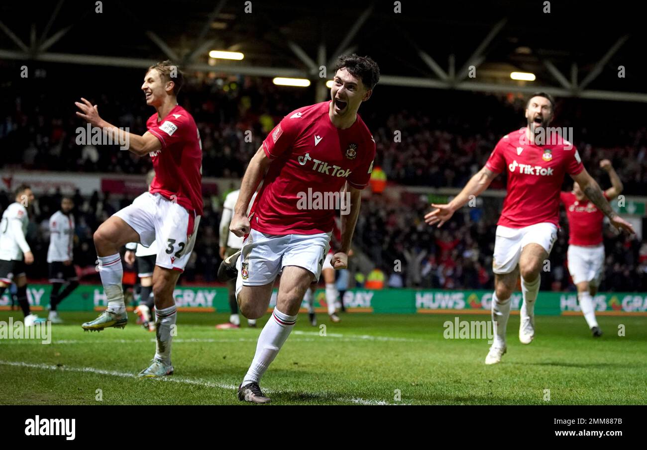 Wrexham's Tom O'Connor celebrates scoring their side's second goal of