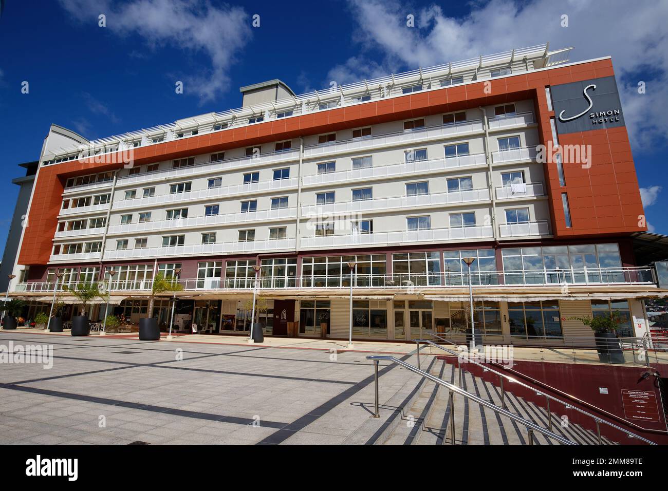View of Simon Hotel on the waterfront of the capital city of Fort-de-France. Martinique island. Stock Photo