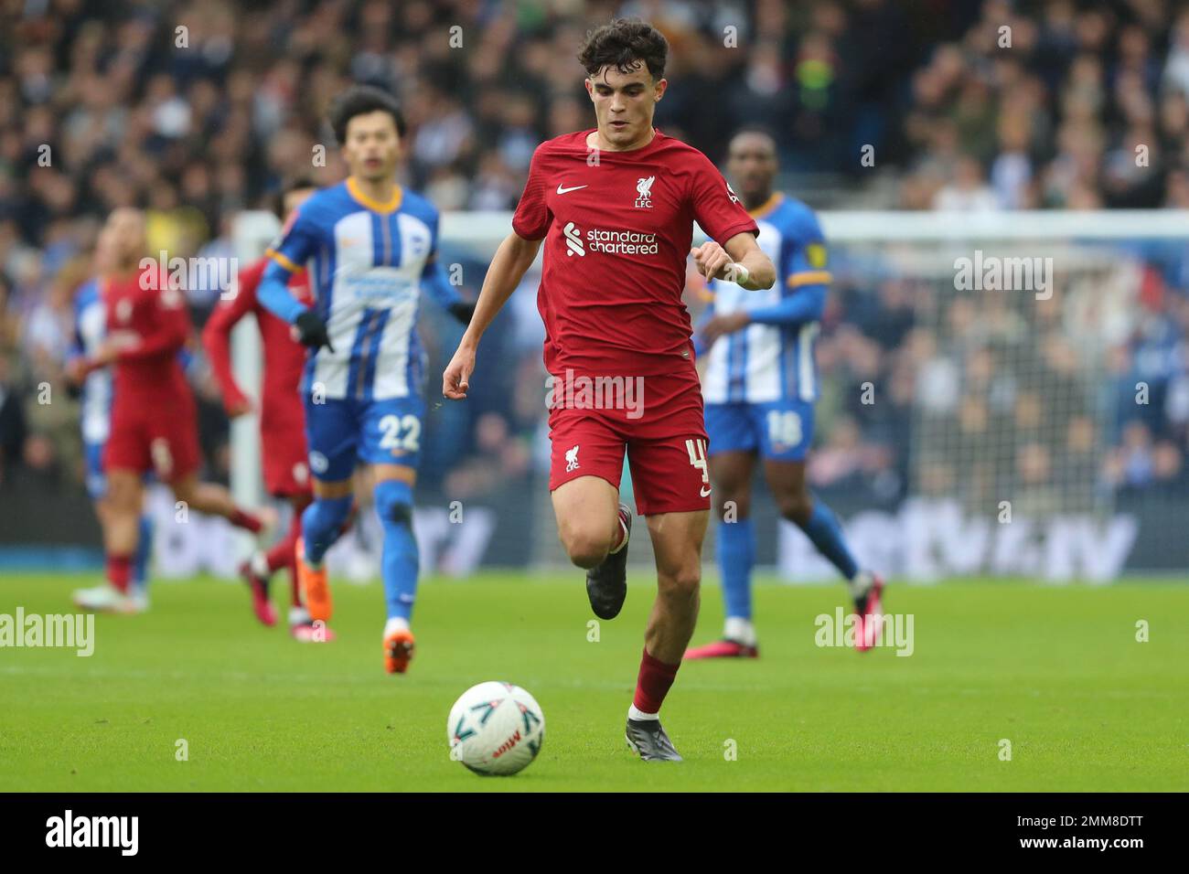 Stefan Bajcetic in action for Liverpool against Brighton & Hove Albion at the AMEX Stadium Stock Photo