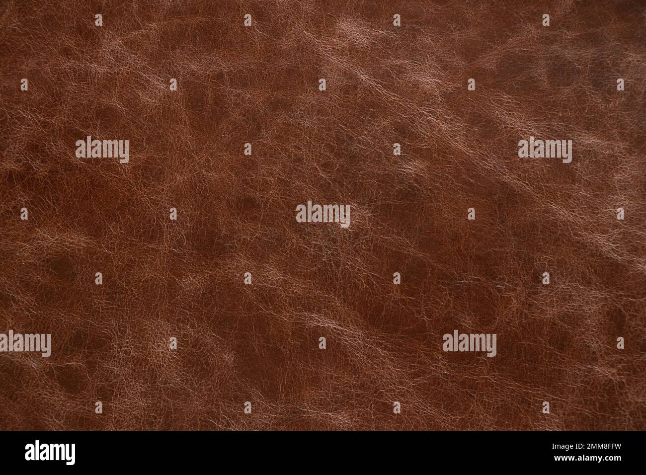 brown skin as background, a piece of brown animal skin, macro photo Stock Photo
