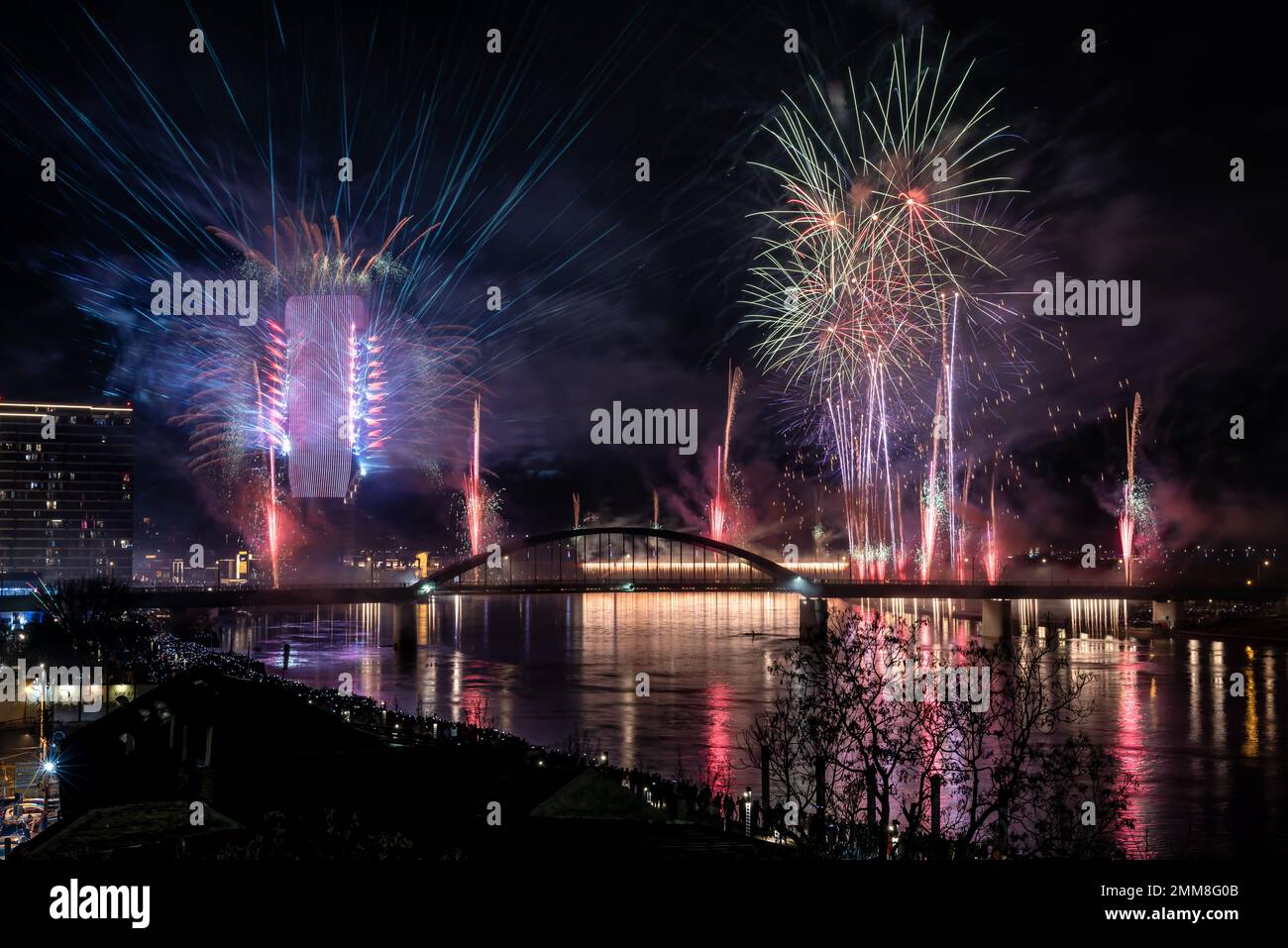 Beautiful New Years firework over business district Belgrade Waterfront on the river Sava in Serbia. Stock Photo
