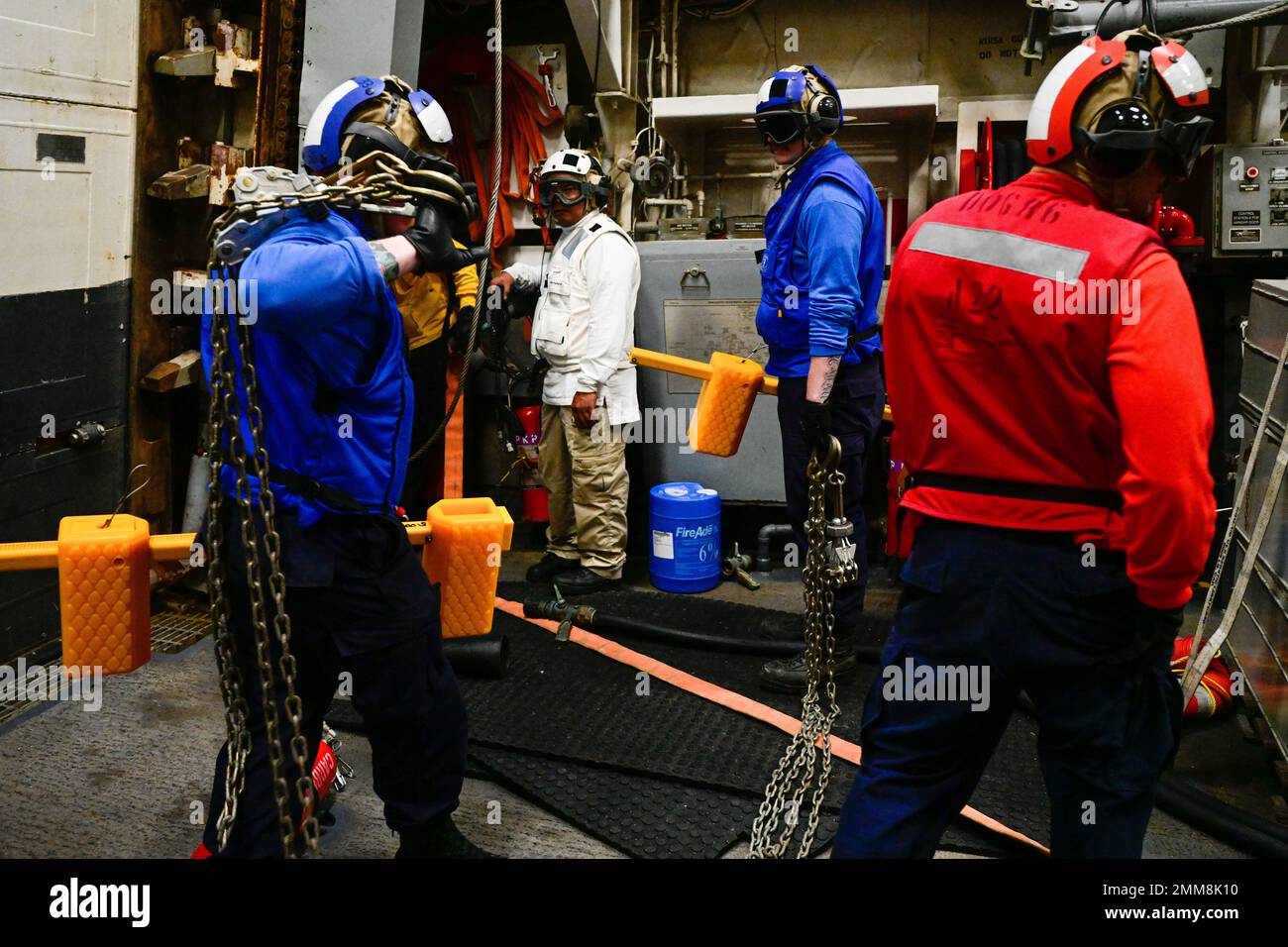 U.S. Sailors assigned to the Arleigh Burke-class guided-missile ...