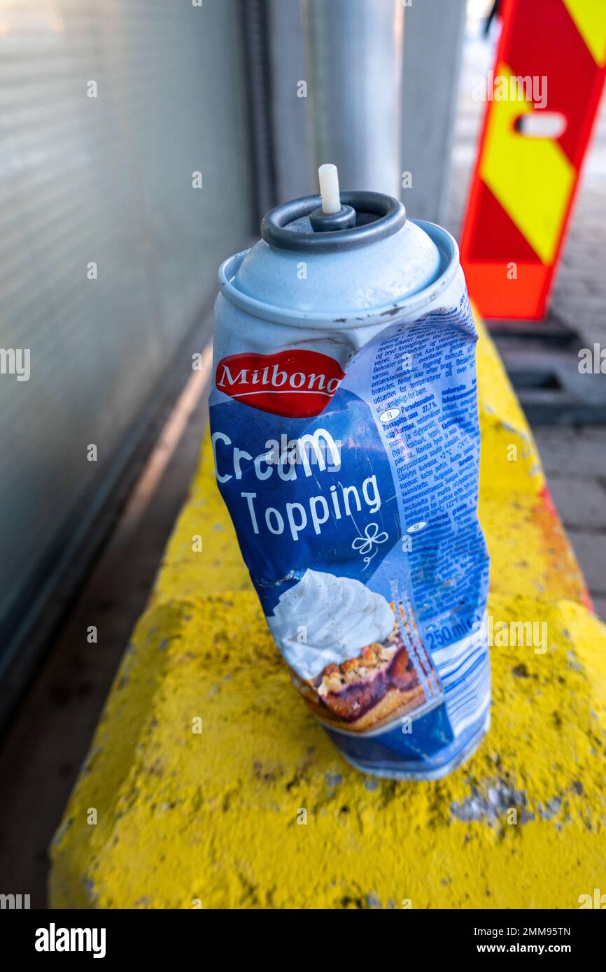 Crushed can of whipped cream with nitrous oxide as propellant Stock