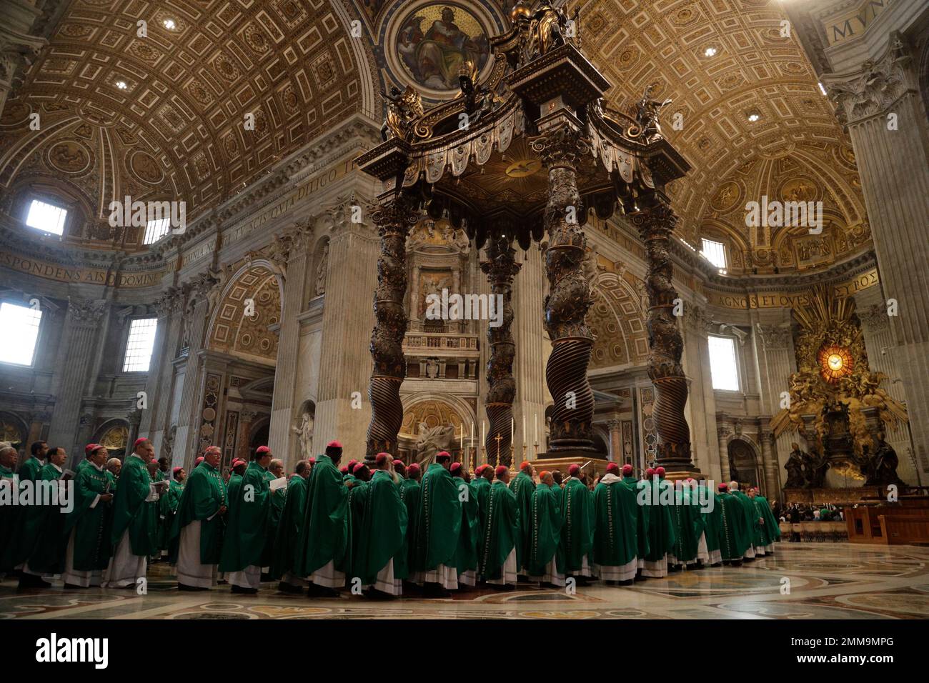 walk in procession as Pope Francis attends a mass with some of