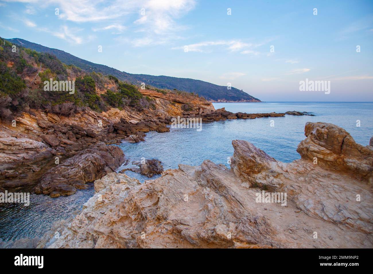 Bathing With Rocks Characteristic rocks of the Mar Morto bathing bay, Monte Argentario ...