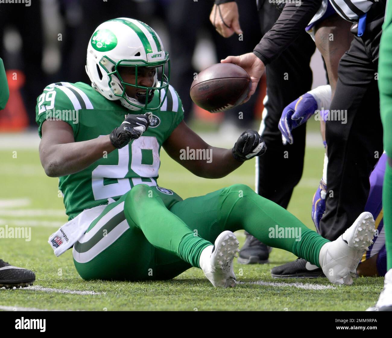 New York Jets running back Bilal Powell (29) sits up after being injured  during the first half of an NFL football game against the Minnesota Vikings  Sunday, Oct. 21, 2018, in East