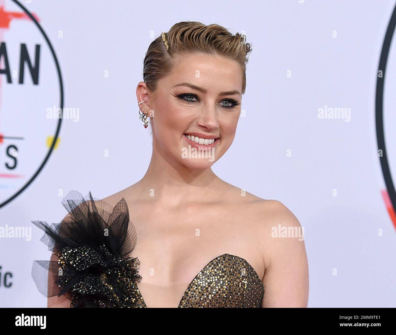FILE - In this Oct. 9, 2018 file photo, actress Amber Heard arrives at the  American Music Awards in Los Angeles. Heard plays the femme fatale Nicola  Six in the film "London