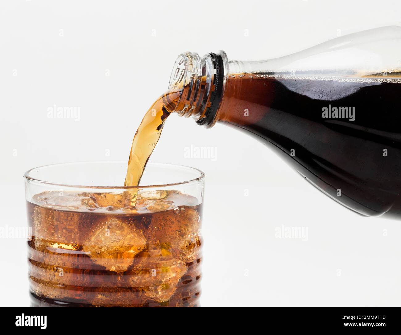 front view soft drink being poured glass. Beautiful photo Stock Photo