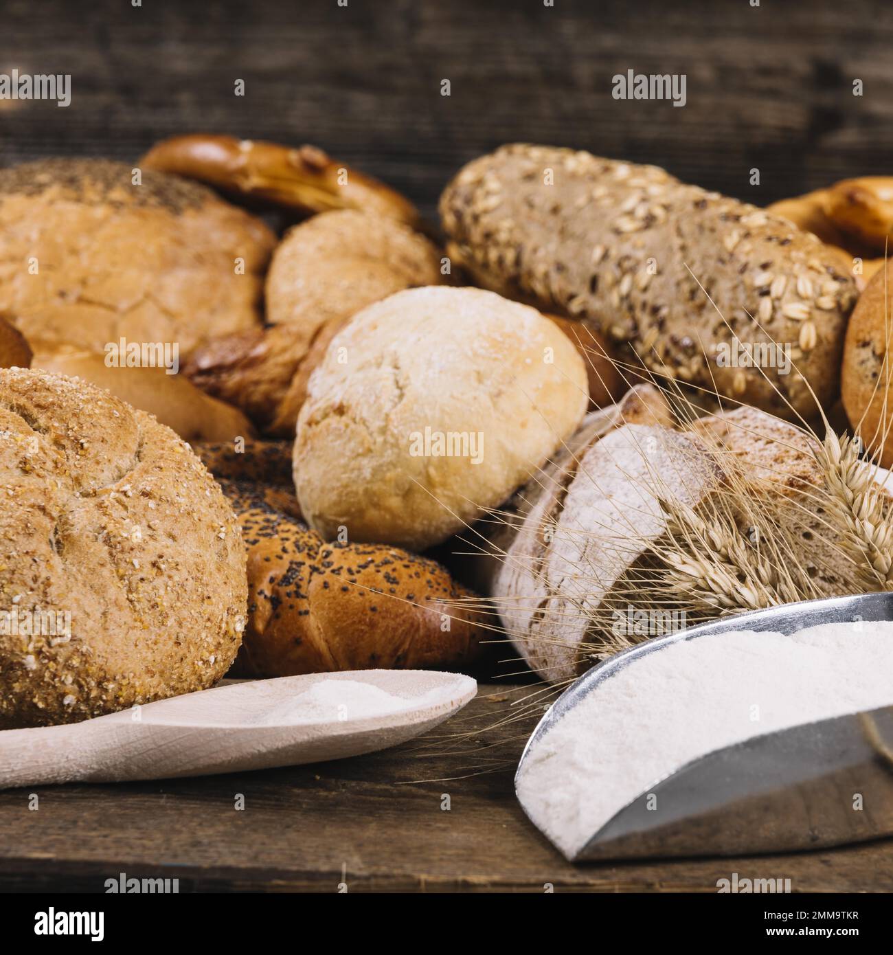 flour with baked whole grain breads table. Resolution and high quality beautiful photo Stock Photo