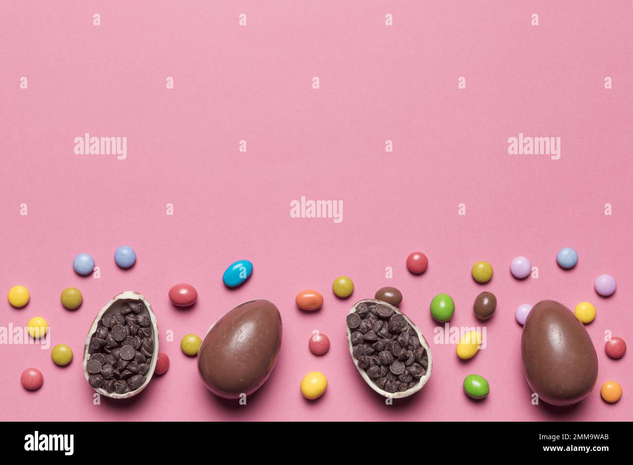 gem candies chocolate easter eggs filled with choco chips pink