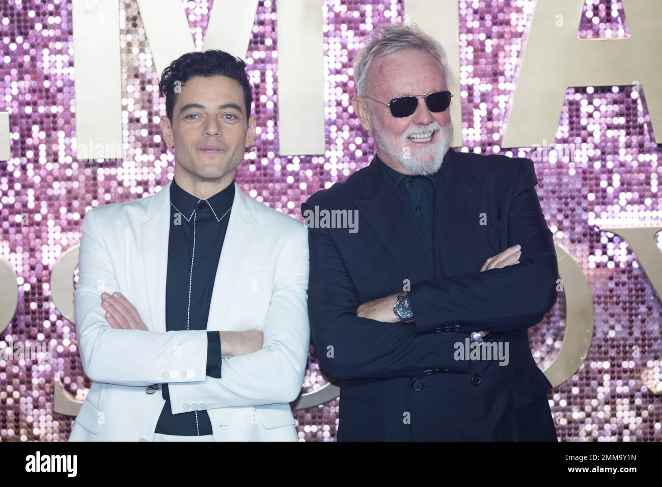 Actor Rami Malek and musician Roger Taylor of Queen pose for ...