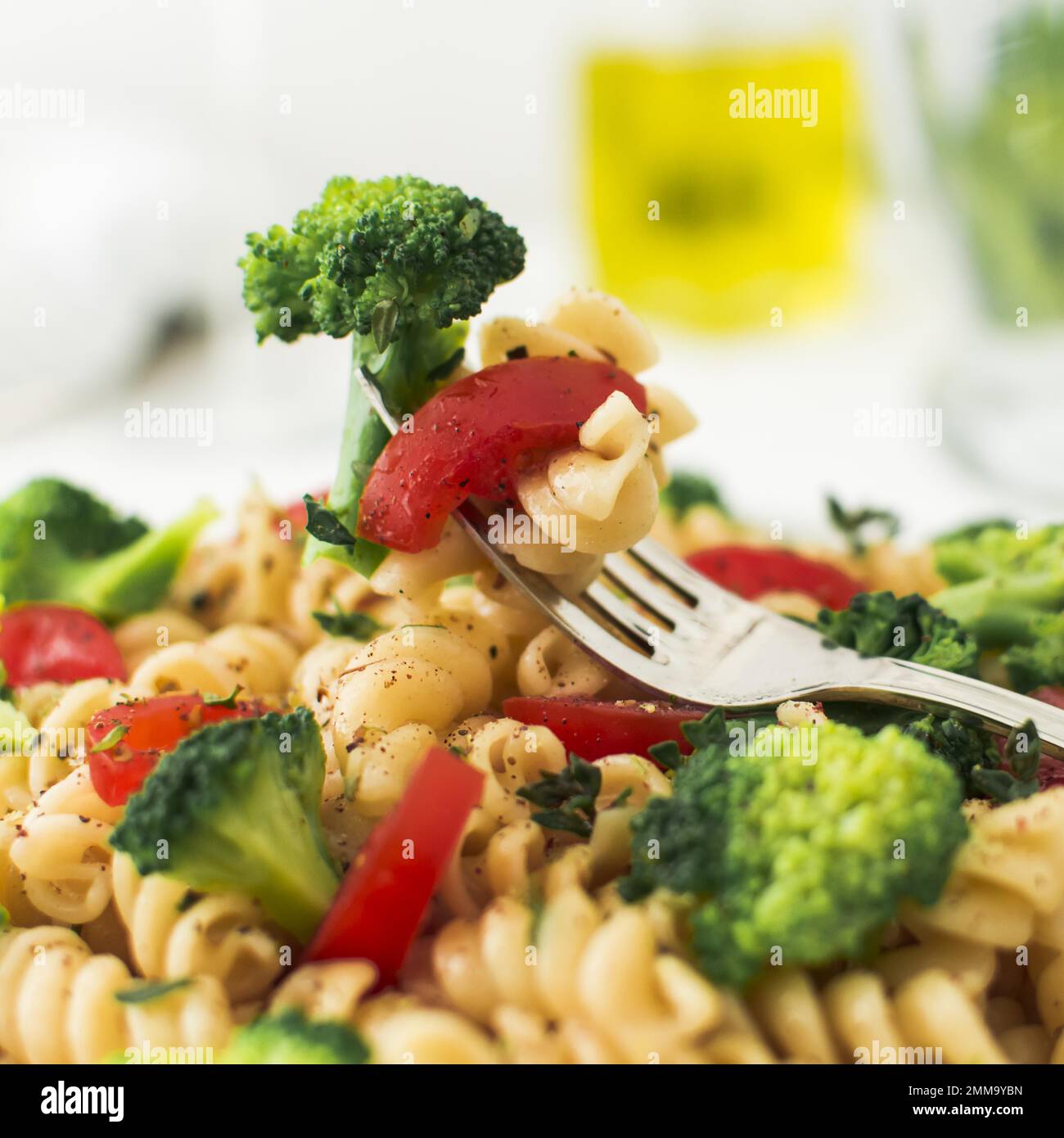 close up fork with broccoli tomato fusilli. Resolution and high quality beautiful photo Stock Photo