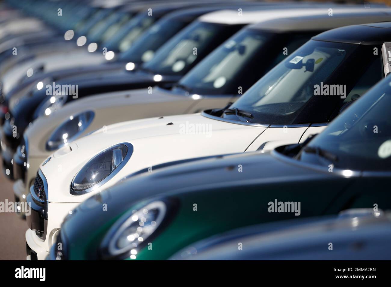 A long line of unsold 2019 hardtops is shown at a Mini Cooper dealership Sunday, Oct. 21, 2018