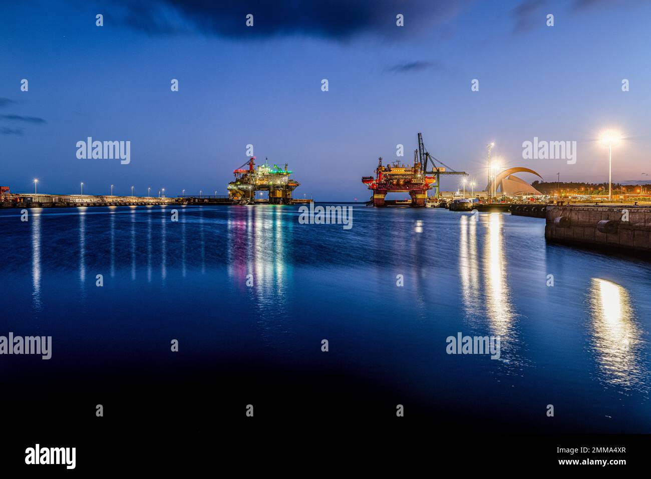Night view of two oil rig in the coastline of Santa Cruz de Tenerife city,long exposure Stock Photo