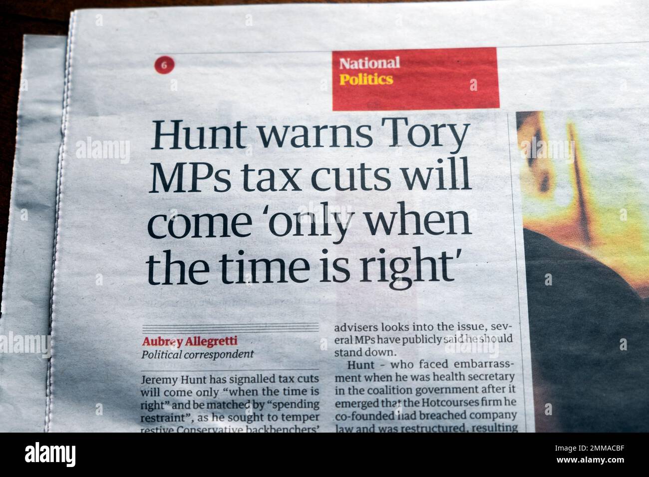 Jeremy 'Hunt warns Tory MPs tax cuts will come 'only when the time is right' Guardian newspaper headline speech article 27 January 2023 London UK Stock Photo