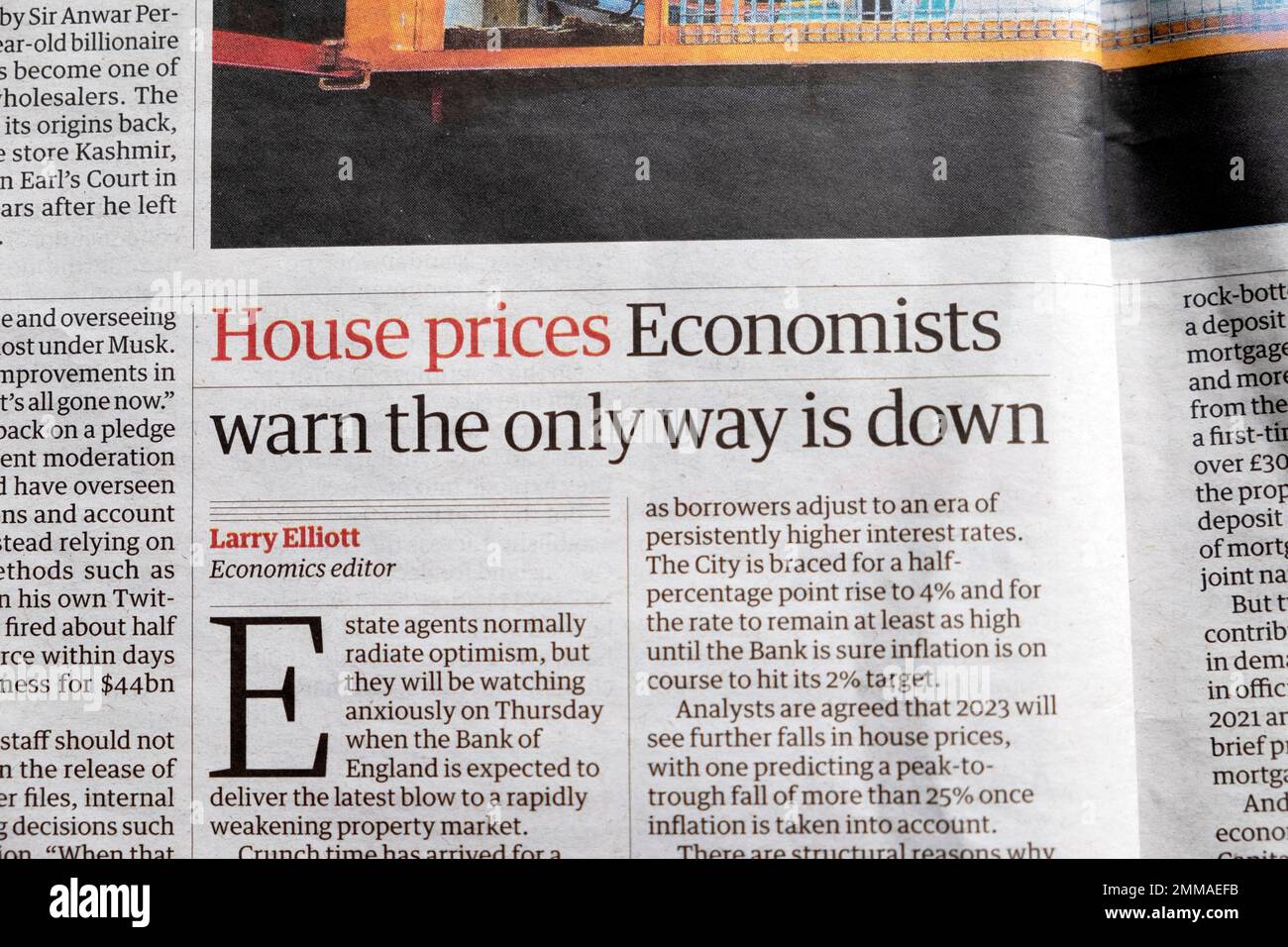 'House prices Economists warn the only way is down' Guardian newspaper headline housing market article clipping cutting 27 January 2023 City London UK Stock Photo