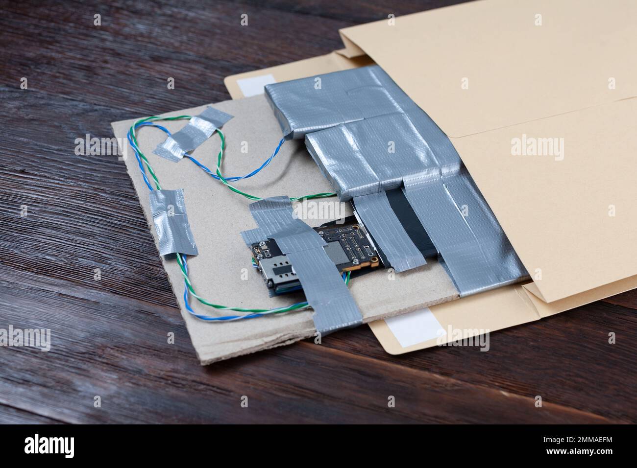 Mail bomb IED Improvised Explosive Device with c4 and cell phone