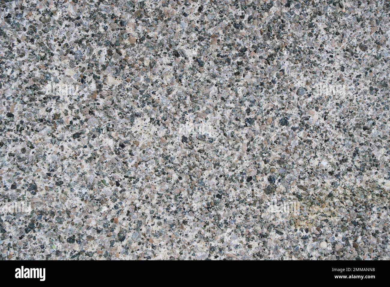 Abstract background, concrete wall with granite chips Stock Photo