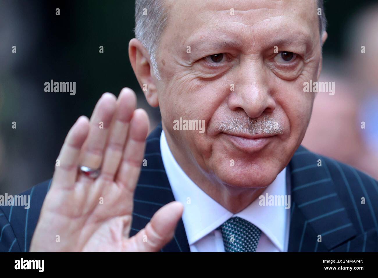 FILE - Turkey's President Recep Tayyip Erdogan waves to the crowd ...