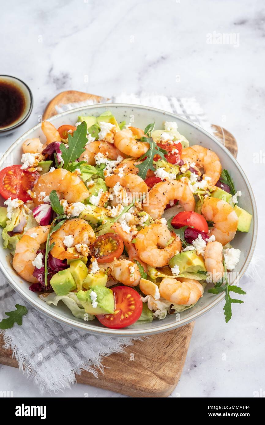 Shrimp salad with cherry tomatoes and avocado Stock Photo
